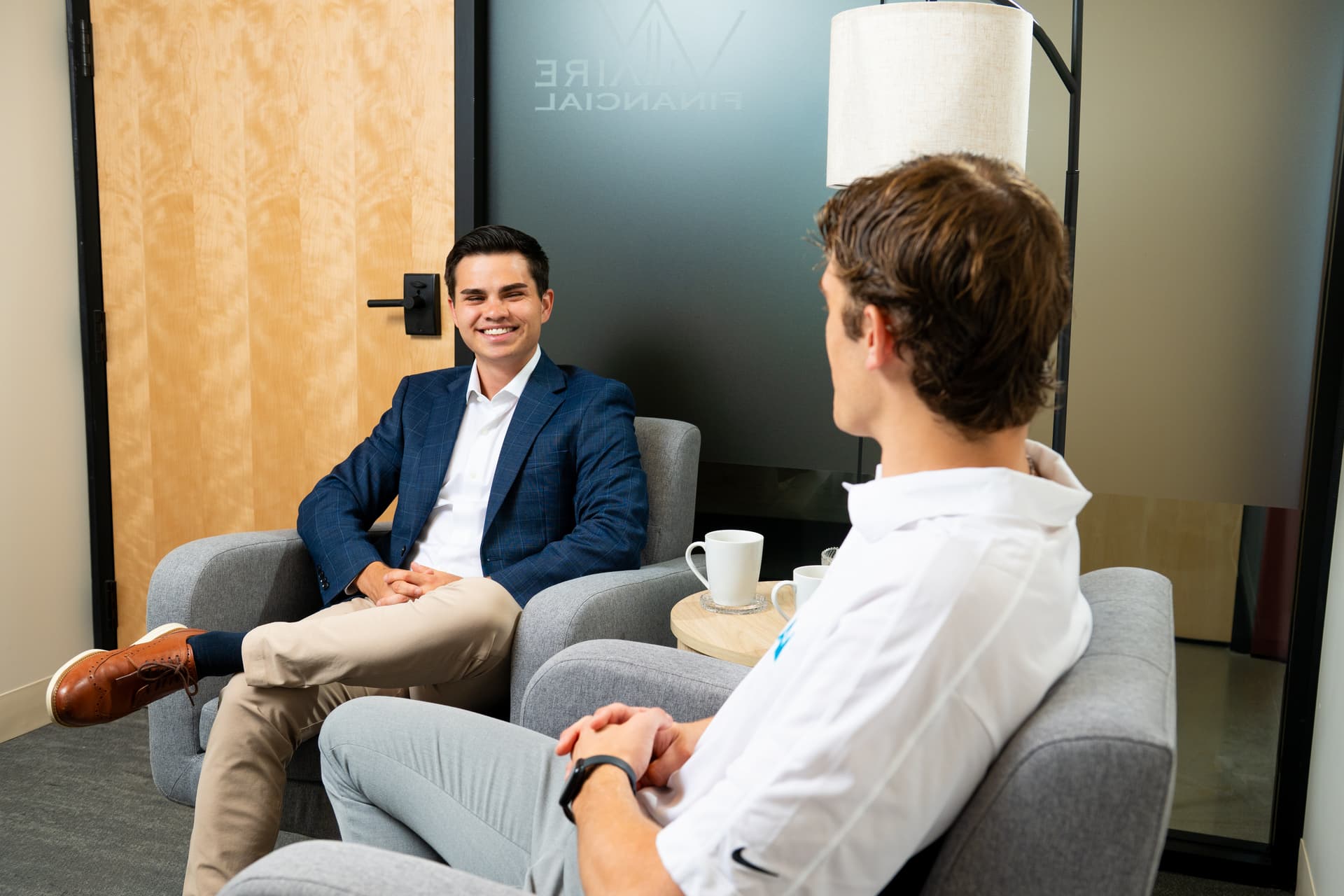 Chris Villaire, CFP®, fiduciary financial advisor in Grand Rapids, MI, meeting with a tax planning client