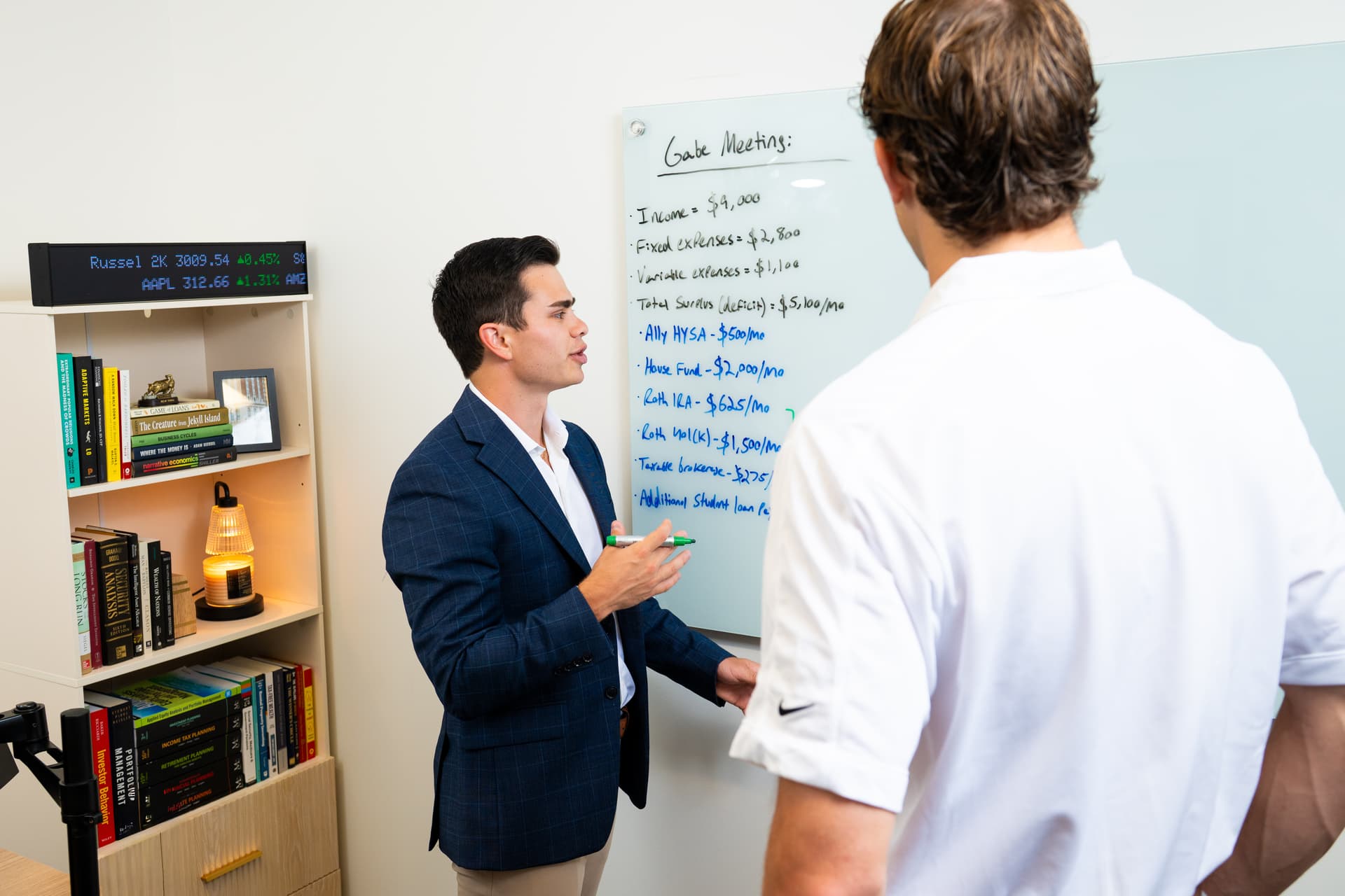 Chris Villaire providing financial education to a client in Grand Rapids, MI